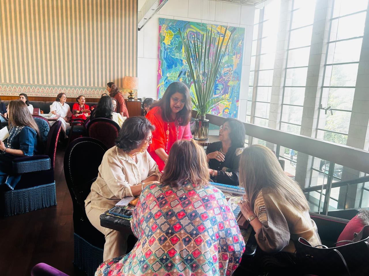 A Mahjong gathering around a table